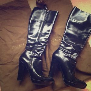 Gucci platform black leather boots.